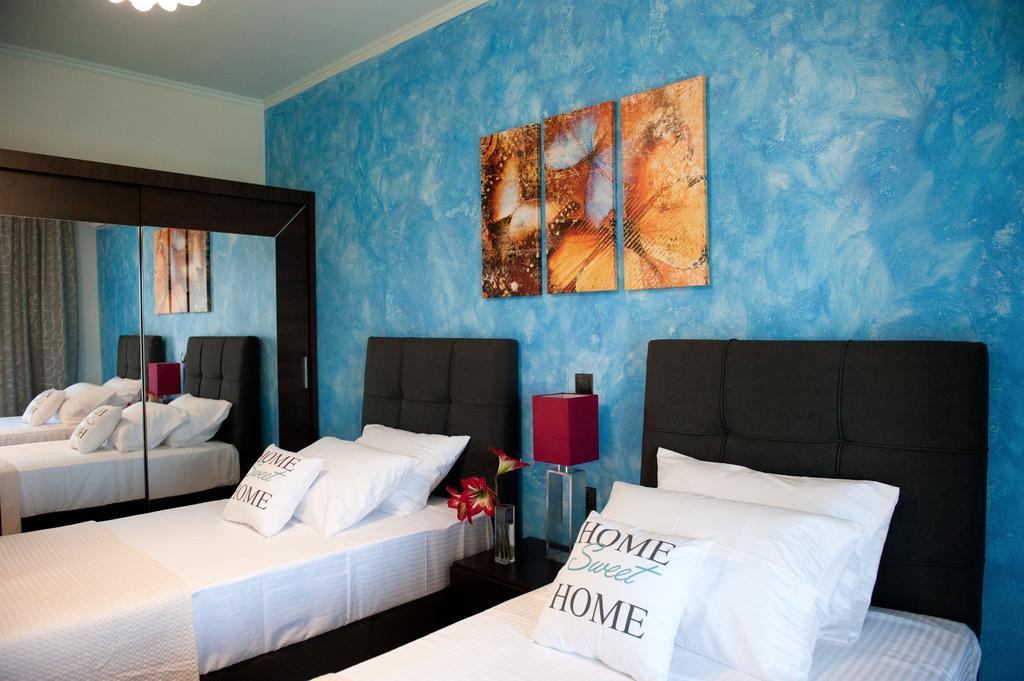 Serenita Apartments Эрмонес Экстерьер фото