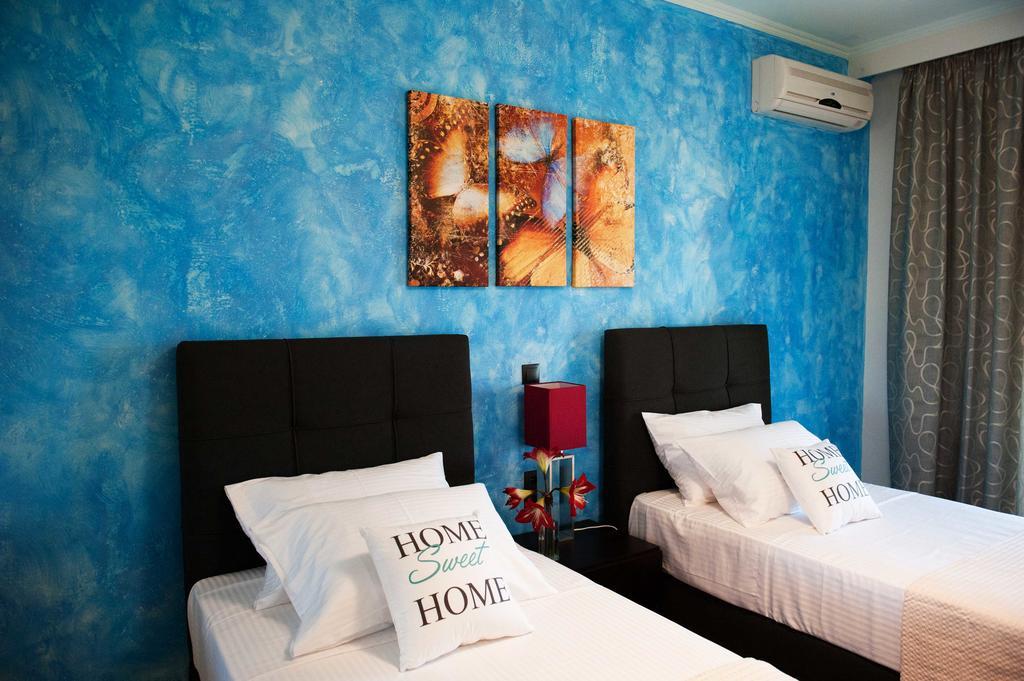 Serenita Apartments Эрмонес Экстерьер фото